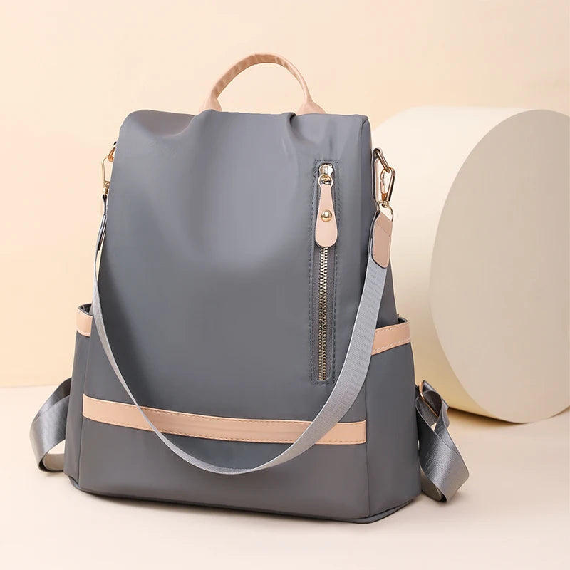 Évasion Élégante – Sac à Dos Antivol Imperméable pour Femme