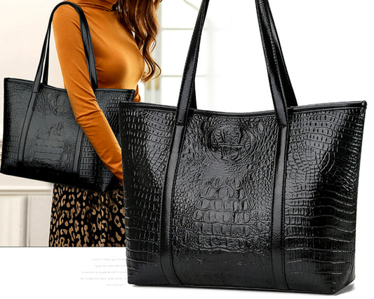 Élégance Sauvage – Sac Seau Vintage en Cuir Crocodile